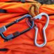 an orange climbing gear string