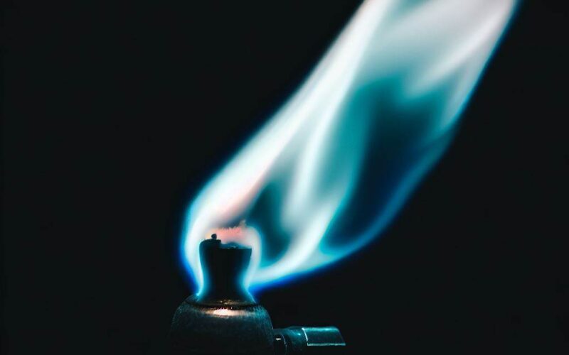 a mapp gas touch giving out a blue flame