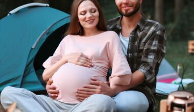 a pregnant woman camping with a man