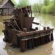 a homemade muck dredge in a pond