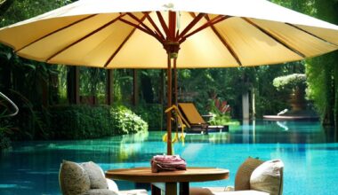 in pool umbrella with table
