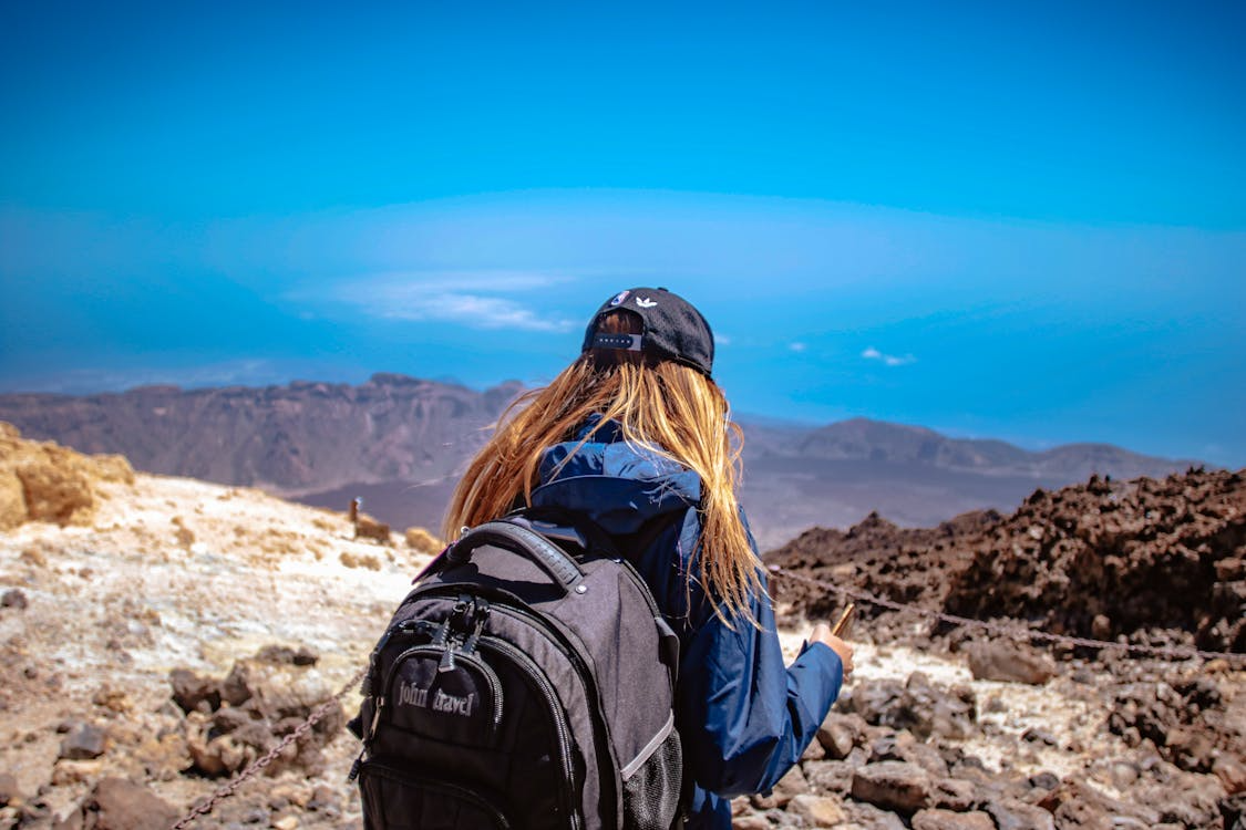 Solo Hikers: An image of a woman on a solo hiking trip