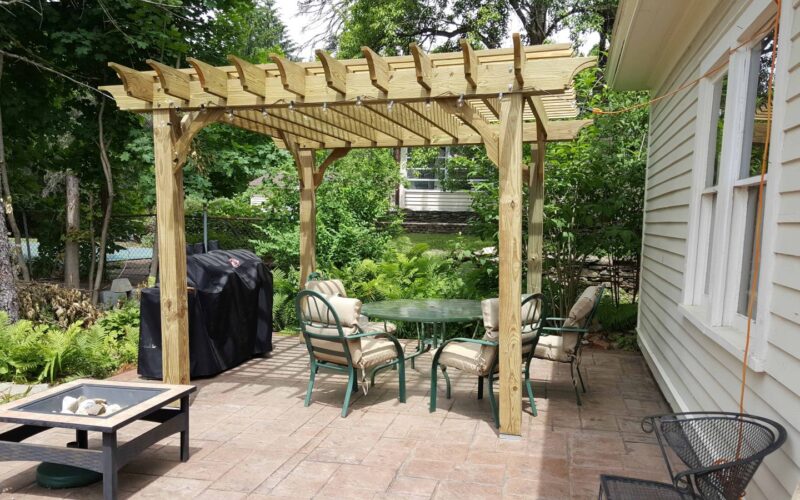 freestanding pergola in backyard