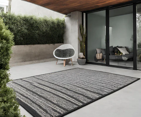 Best ways to cover a concrete patio with colorful outdoor rug for a cozy look