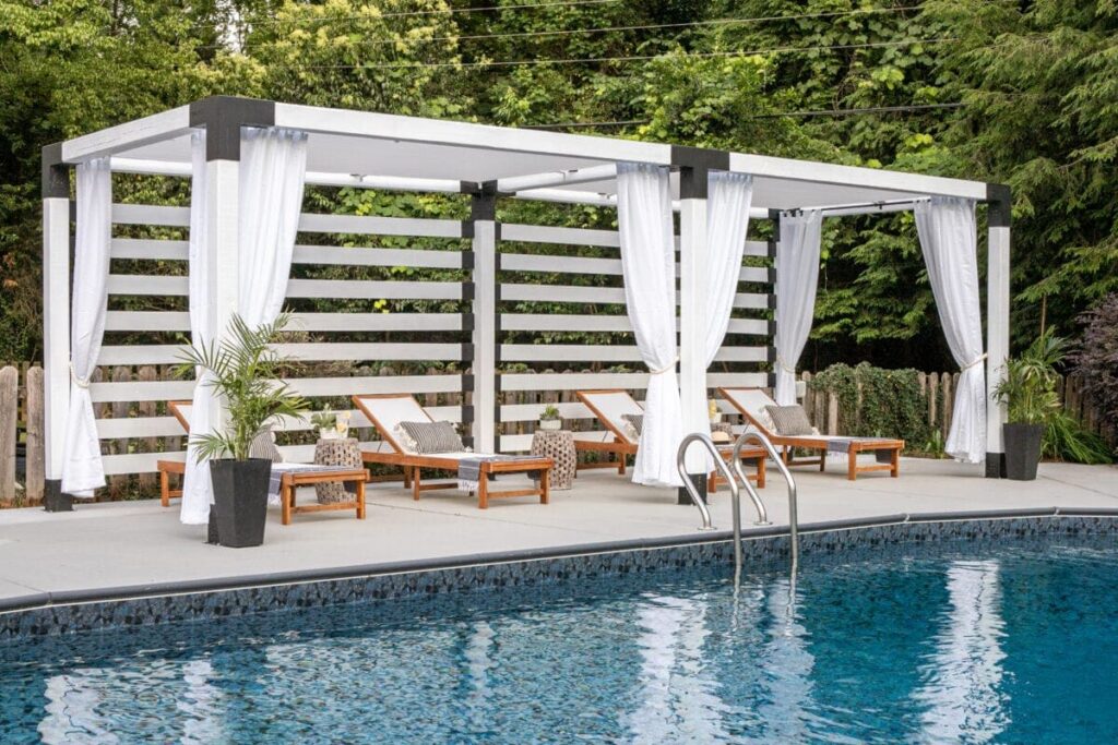 Luxury cabana outdoor structure with shade and curtains